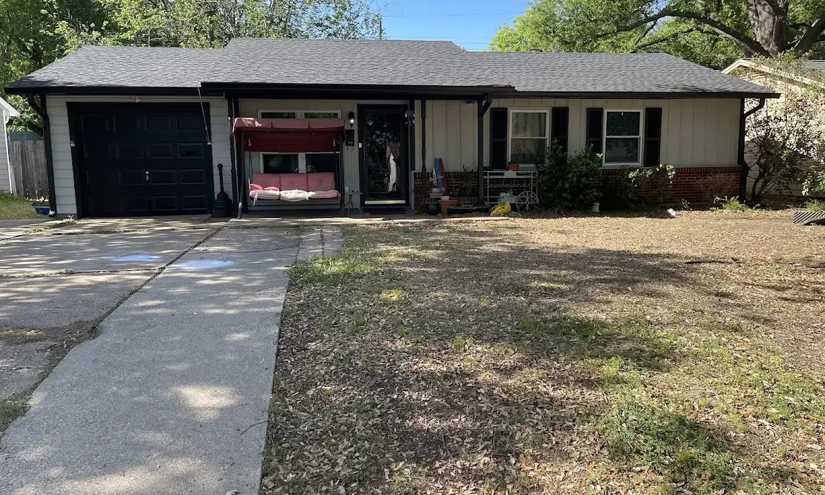 Asphalt Shingle Roof Repair crew at work on a residential roof in Conover